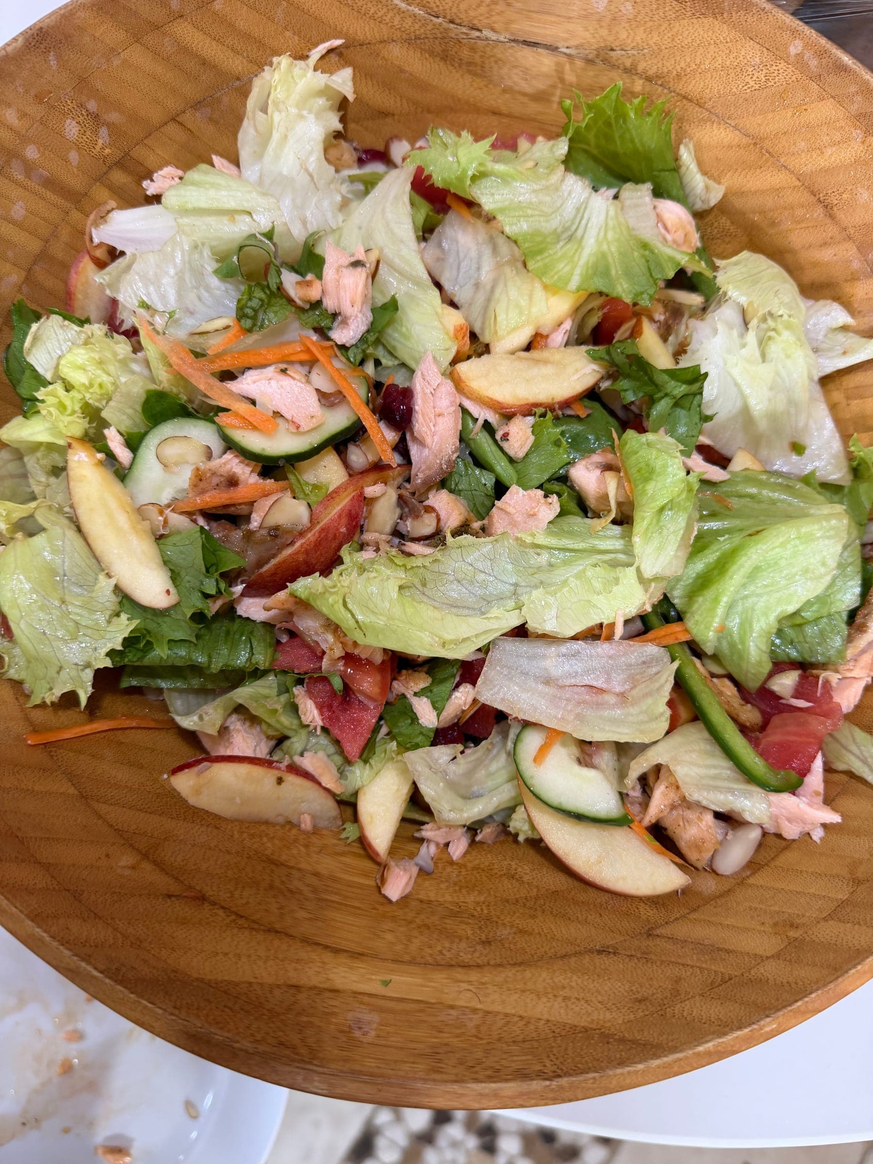 Large garden salad with apple, greens and vegetables