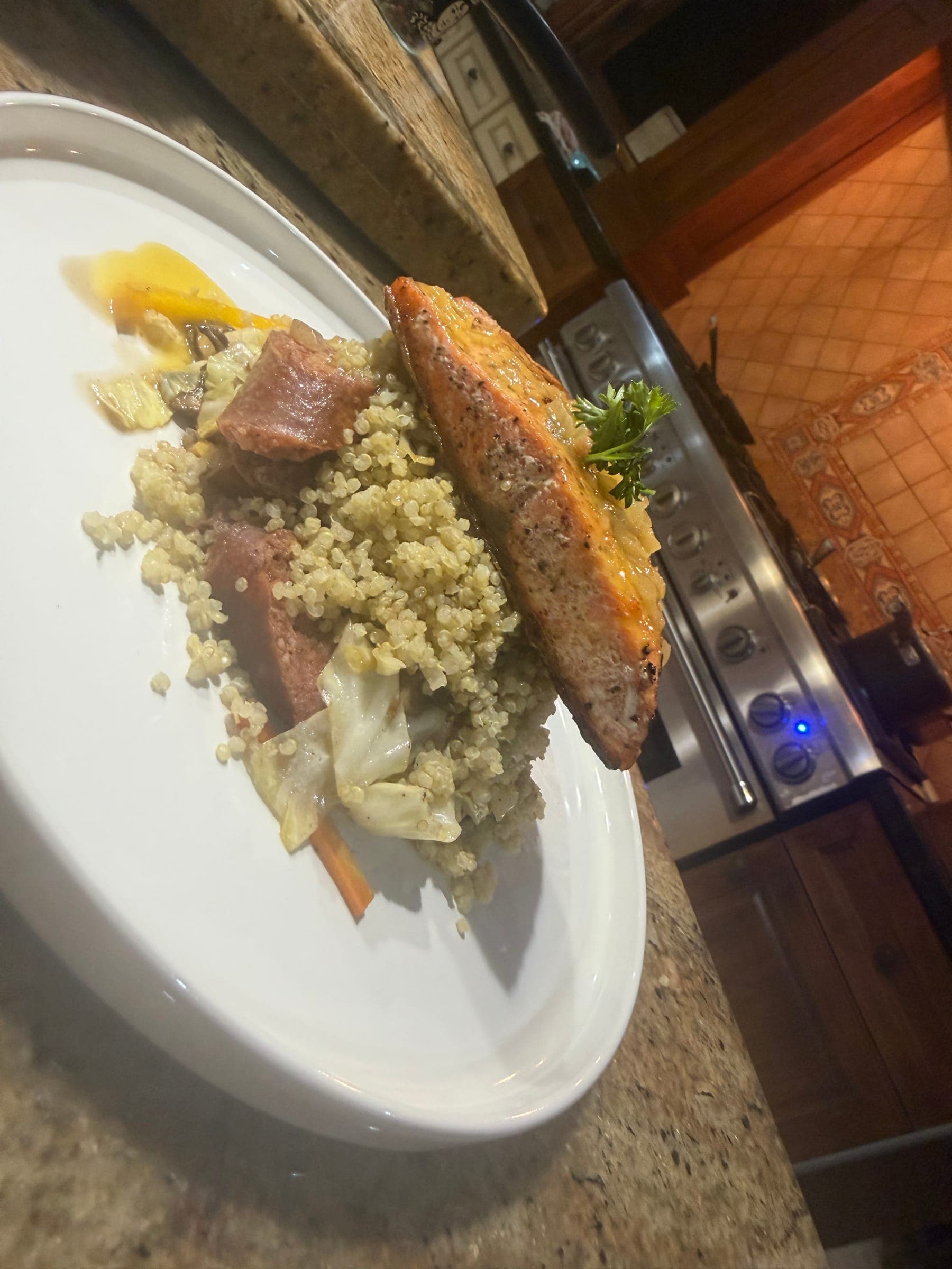Seared fish fillet over seasoned grains